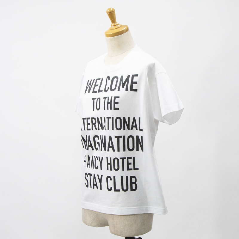 Thomas magpie トーマスマグパイ  ミニTシャツ “WELCOME TO THE INTERNATIONAL IMAGINATION FANCY STAY HOTEL CLUB” 2252871